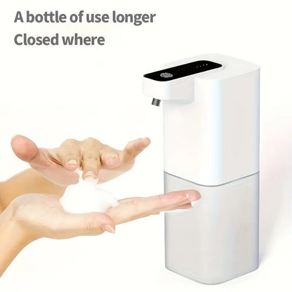Hand soap dispenser with hands using it on a white background